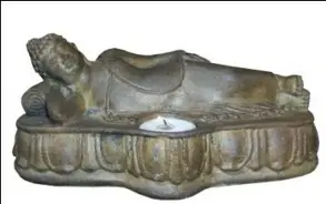 lying buddha with candle 25x10x10